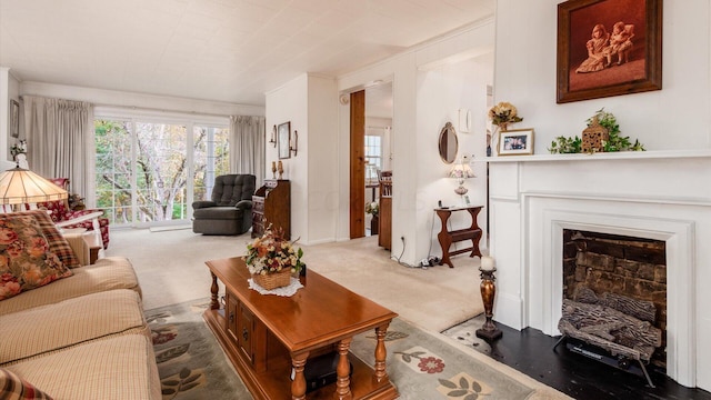 carpeted living room featuring crown molding