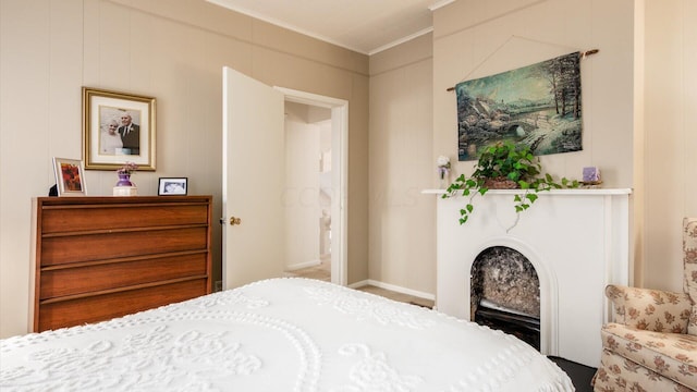 bedroom with crown molding