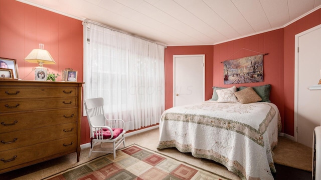 carpeted bedroom featuring ornamental molding