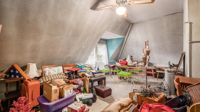 playroom featuring ceiling fan and lofted ceiling