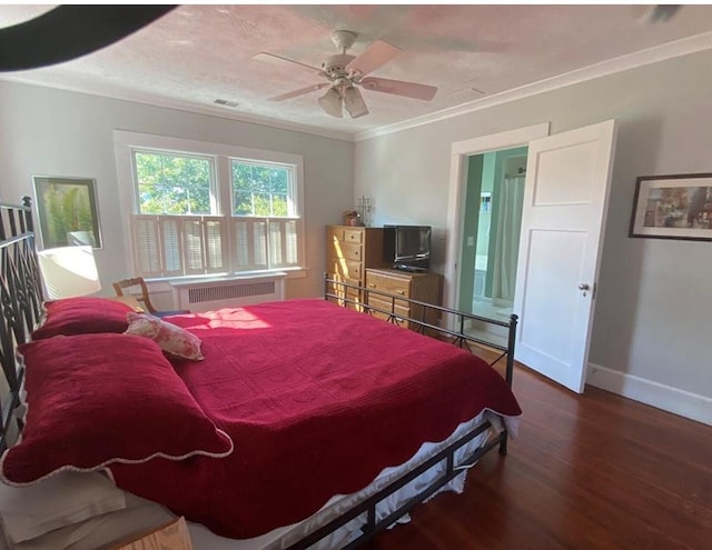 bedroom with radiator, ceiling fan, dark hardwood / wood-style floors, and ornamental molding