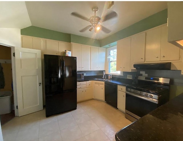 kitchen with lofted ceiling, black appliances, white cabinets, sink, and tasteful backsplash