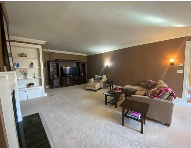 carpeted living room featuring ornamental molding