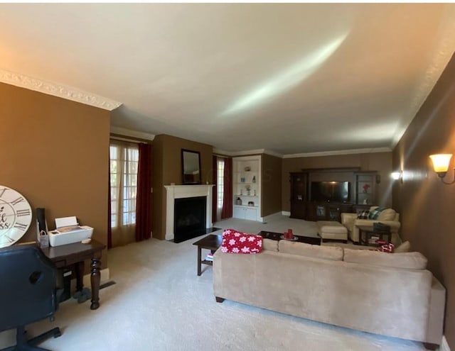 living room featuring crown molding and light carpet