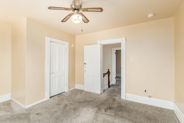 2402 E Ave, Columbus, OH 43202 - unfurnished room with carpet floors, ceiling fan, and a smoke detector