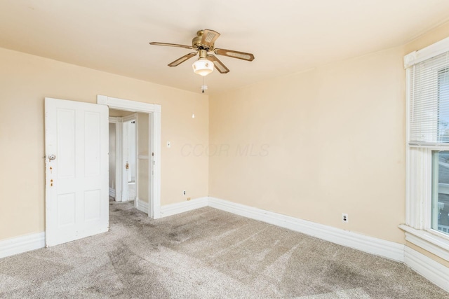 2402 E Ave, Columbus, OH 43202 - carpeted empty room with ceiling fan and baseboards