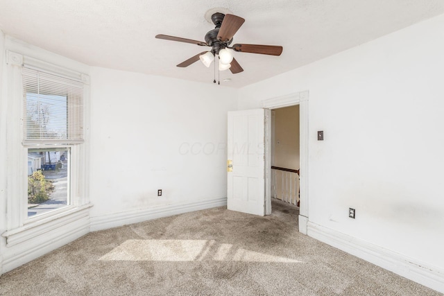 2402 E Ave, Columbus, OH 43202 - empty room featuring carpet flooring and ceiling fan