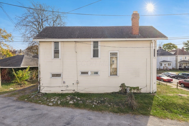 2402 E Ave, Columbus, OH 43202 - view of property exterior featuring a chimney