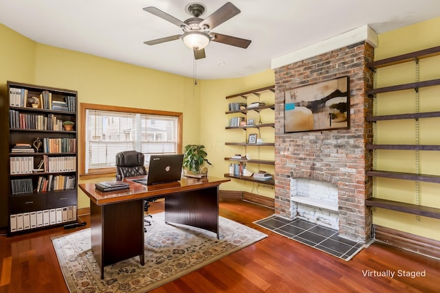 2402 E Ave, Columbus, OH 43202 - office space featuring wood finished floors, a ceiling fan, and a brick fireplace