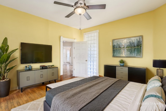 2402 E Ave, Columbus, OH 43202 - bedroom featuring wood-type flooring and a ceiling fan