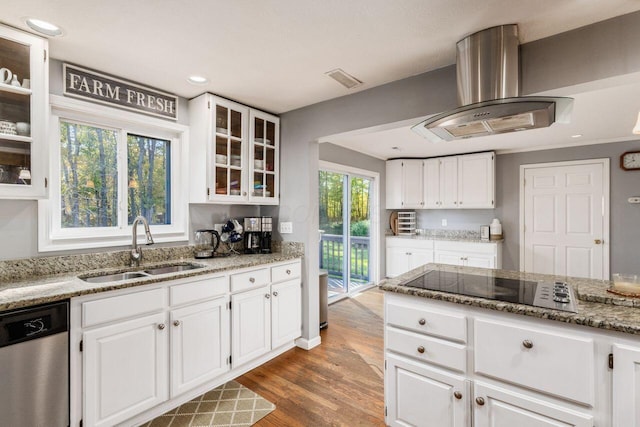 kitchen with sink, white cabinets, and stainless steel dishwasher