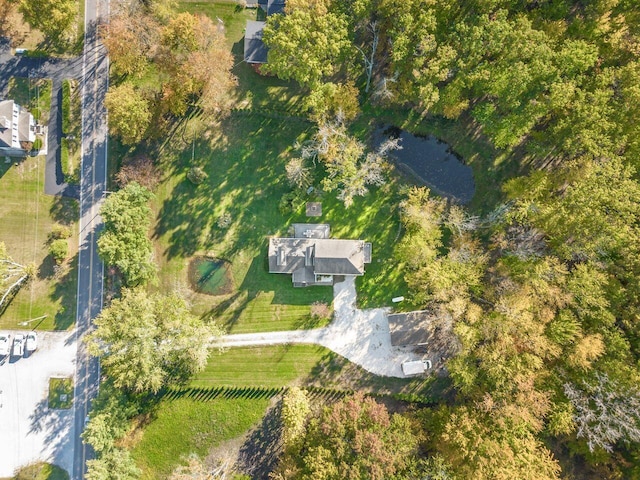 birds eye view of property with a rural view