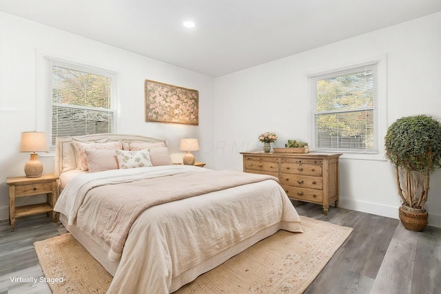 bedroom featuring dark wood-type flooring