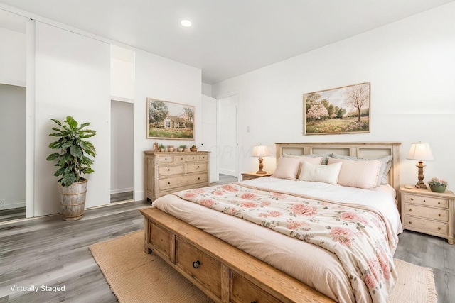 bedroom featuring hardwood / wood-style floors