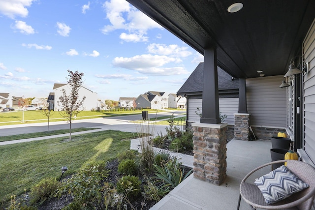 view of patio featuring a porch