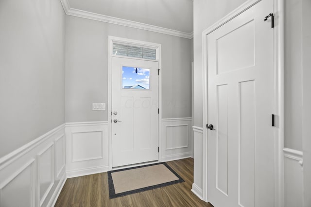 entryway featuring crown molding and dark wood-type flooring