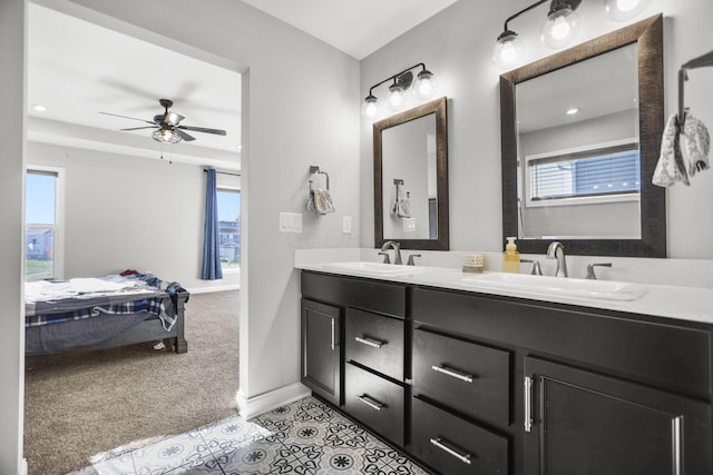 bathroom featuring vanity and ceiling fan