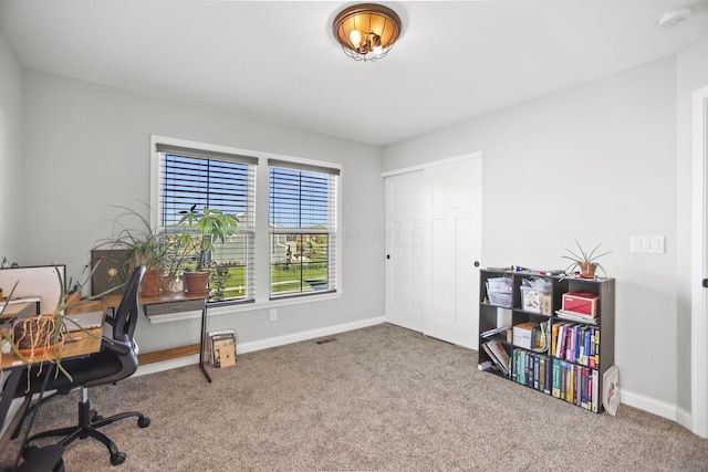 view of carpeted office space