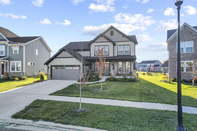 craftsman inspired home featuring a garage and a front yard