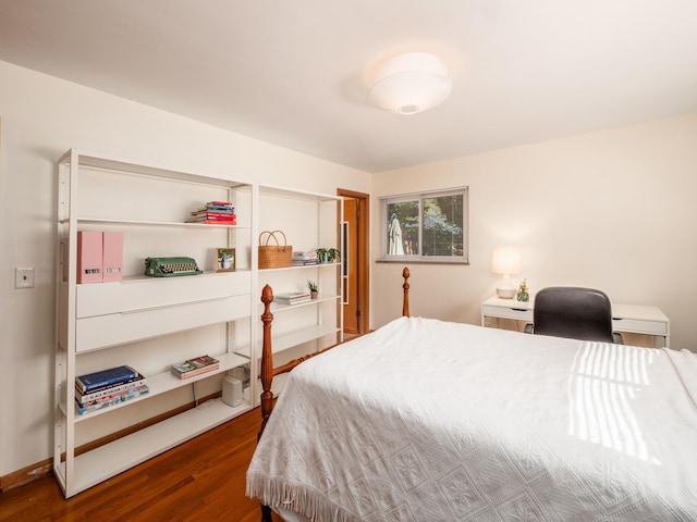 bedroom featuring dark hardwood / wood-style floors