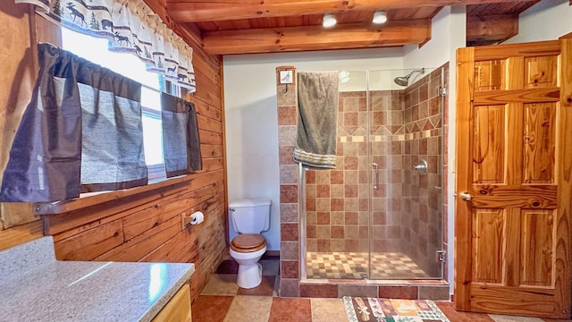 bathroom featuring a shower with door, wooden walls, beam ceiling, wooden ceiling, and toilet