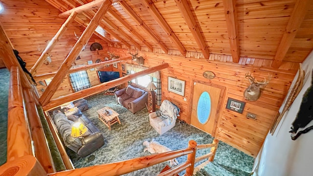 interior space with vaulted ceiling with beams, wooden ceiling, and wood walls