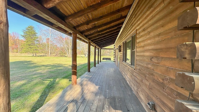 deck featuring a lawn