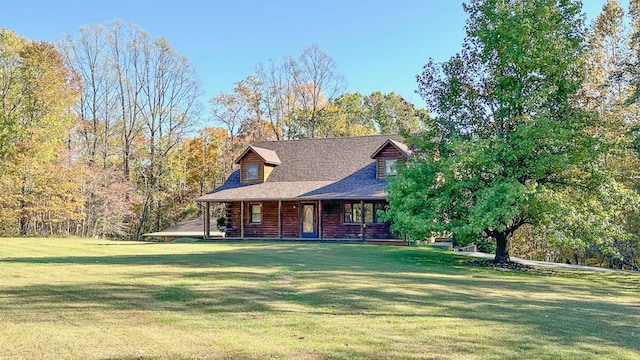 view of front of home featuring a porch and a front lawn