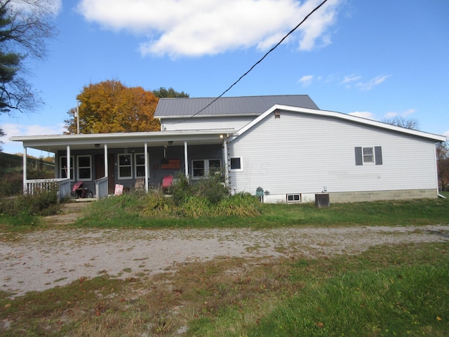 back of house featuring central AC and a porch