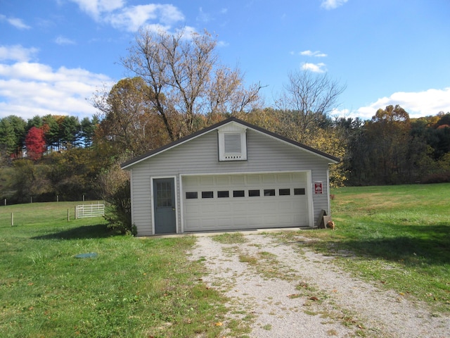 garage with a lawn