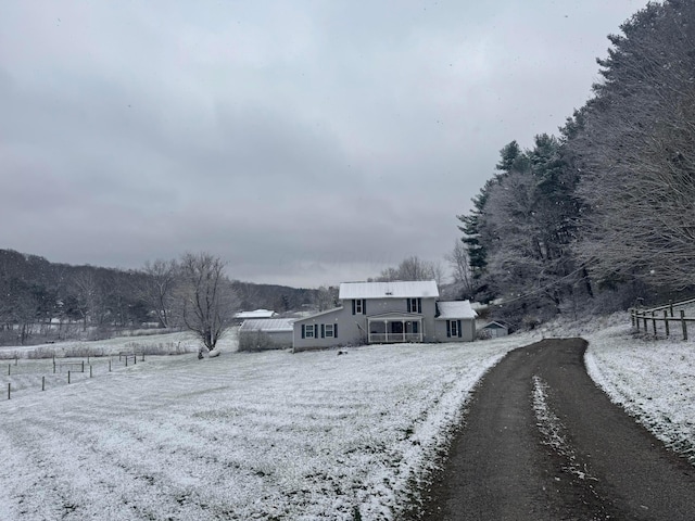 exterior space with a rural view