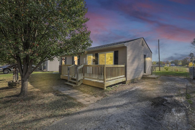 view of front of house featuring a deck