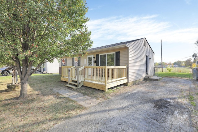 ranch-style house with a deck