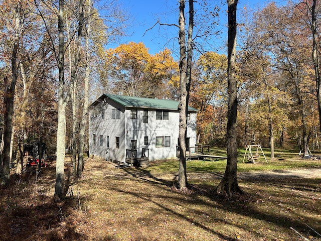 exterior space featuring a front lawn