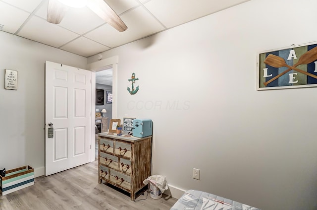 514 Mount Vernon Ave, Thornville, OH 43076 - bedroom featuring light wood-style floors, a ceiling fan, and a drop ceiling