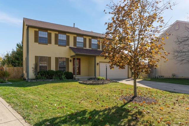 view of front of property featuring a front lawn and a garage