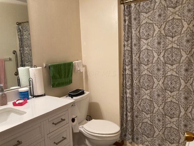 bathroom with vanity and toilet