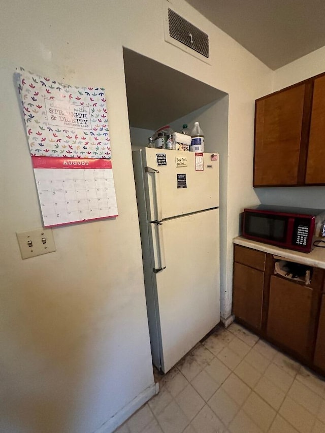 kitchen with white fridge