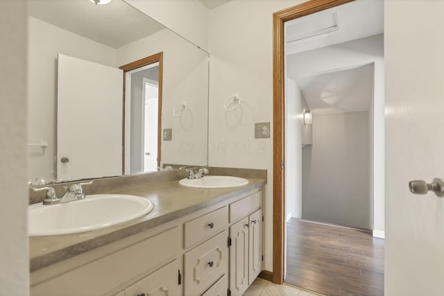 bathroom featuring wood-type flooring and vanity