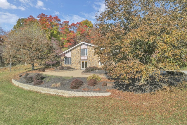 exterior space with a front yard