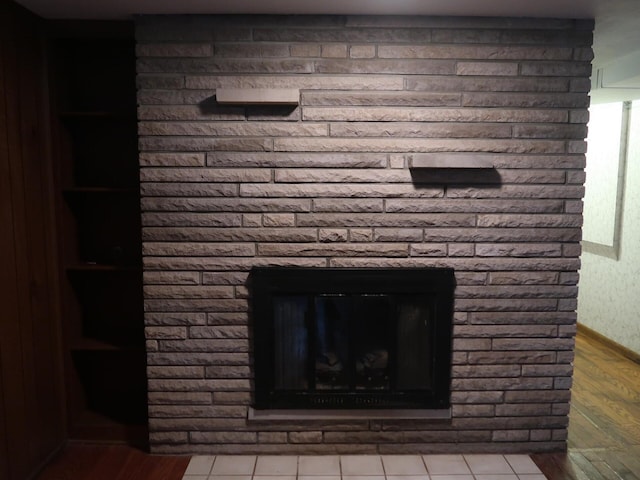 details featuring a fireplace and hardwood / wood-style floors