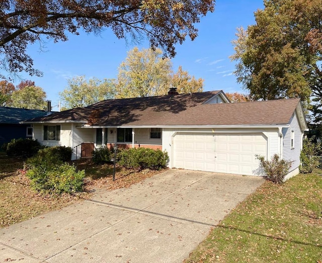 ranch-style house featuring a garage