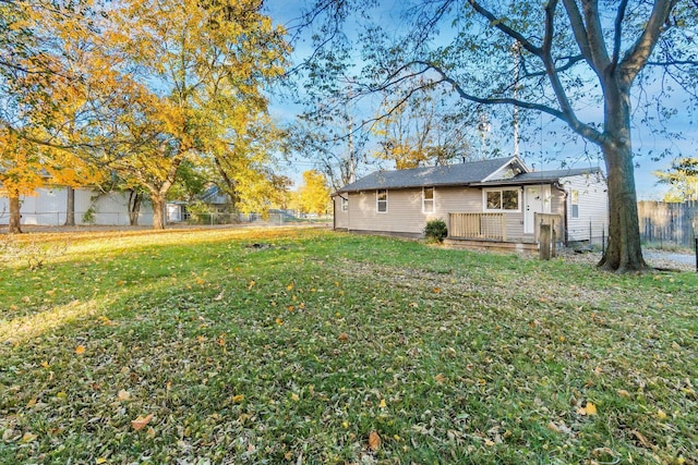 view of yard featuring a wooden deck