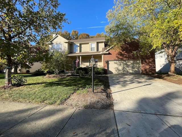 front of property featuring a garage and a front lawn