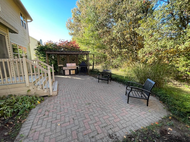 view of patio with a grill