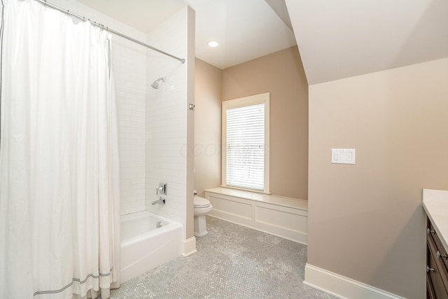 full bathroom featuring shower / bath combo with shower curtain, toilet, vanity, and tile patterned flooring