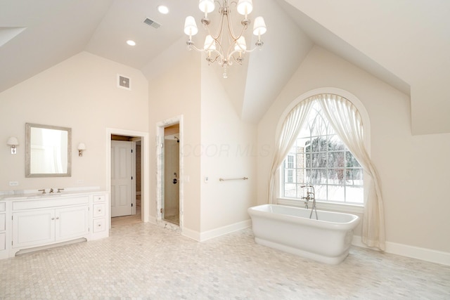 bathroom featuring tile patterned flooring, high vaulted ceiling, a notable chandelier, vanity, and plus walk in shower