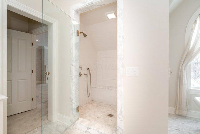 bathroom featuring a tile shower