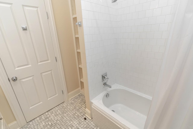 bathroom featuring shower / bath combination with curtain