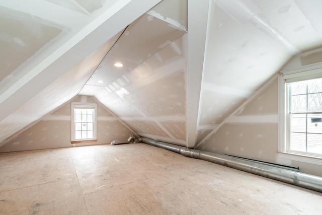 additional living space with vaulted ceiling